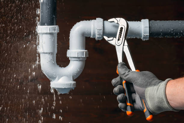 Professional Drain Cleaning technician working in Staples, CT
